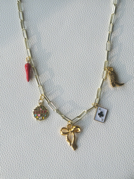 Gold bow charm necklace