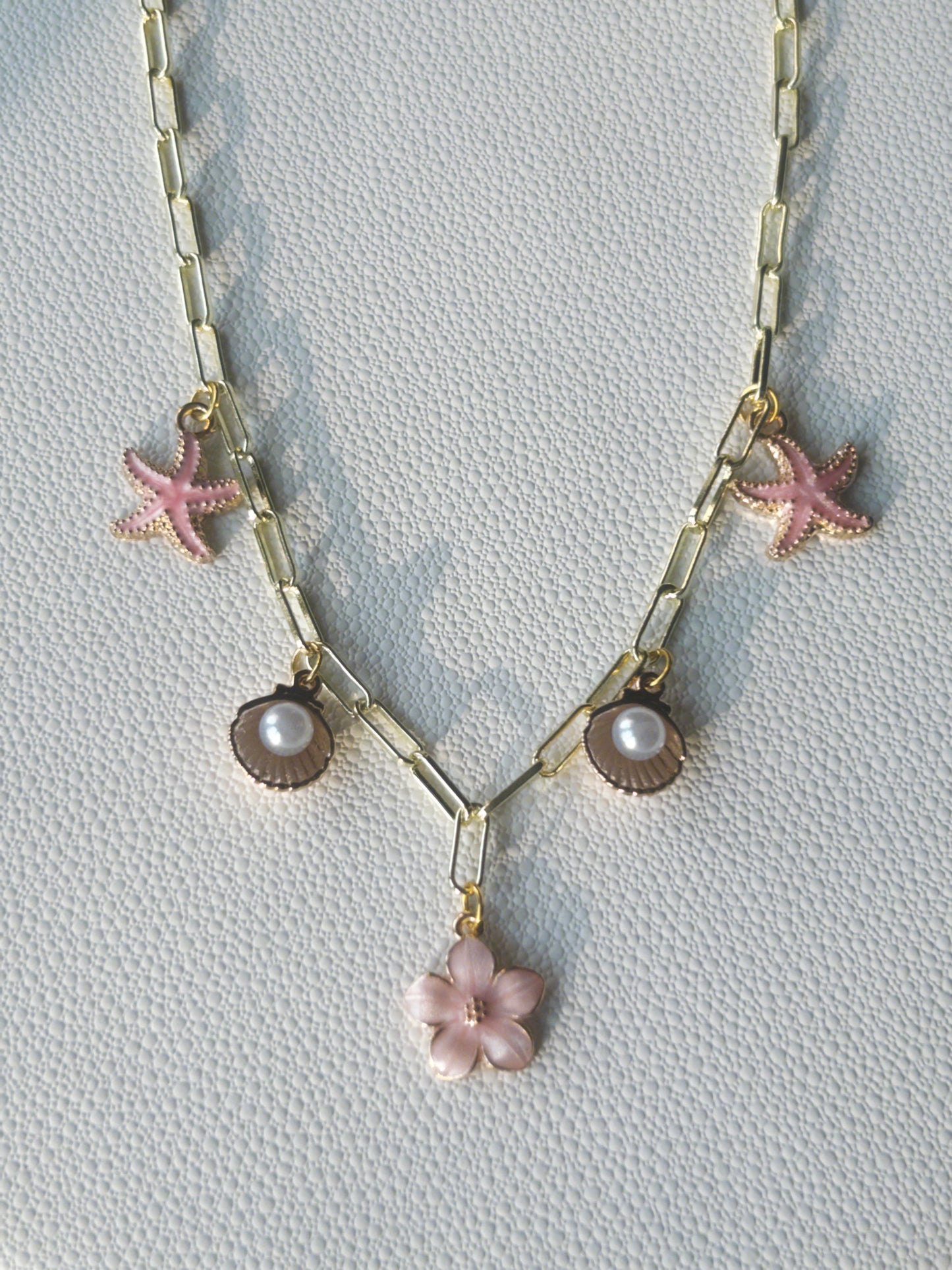 Pink charm necklace